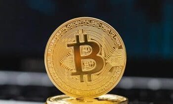 Dollar nears two-week lows as rate-hike bets recede, sending Bitcoin and Ether sharply higher