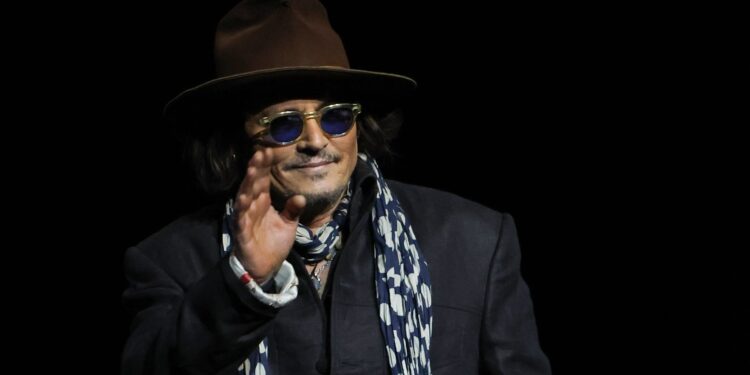 Bah, humbug: Johnny Depp wipes his grid for Ebenezer
