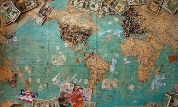 Dollar weakness lifts emerging-market currencies to fresh records