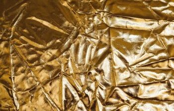 Gold holds steady near $4,650 as investors await critical US inflation data