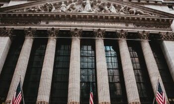 Dow surges 559 points as US business activity hits four-year high